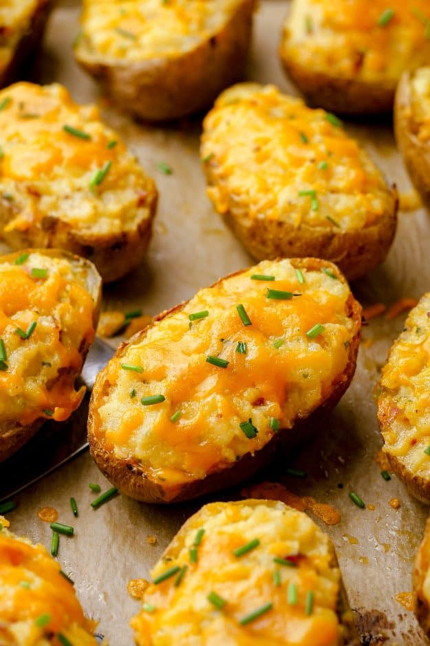 twice baked potatoes on baking sheet.