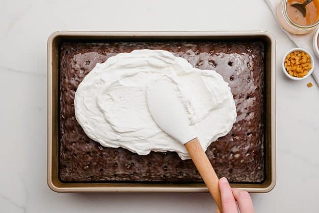 cake spread with whipped topping.