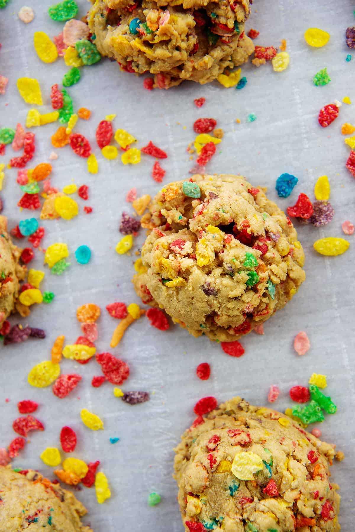 Fruity pebbles cookies on baking sheet.