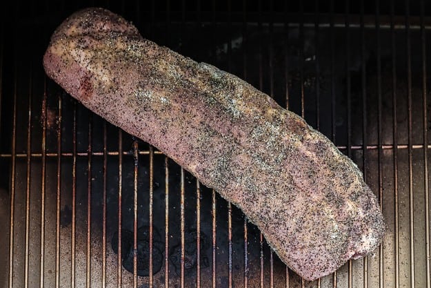 rack of ribs in smoker.