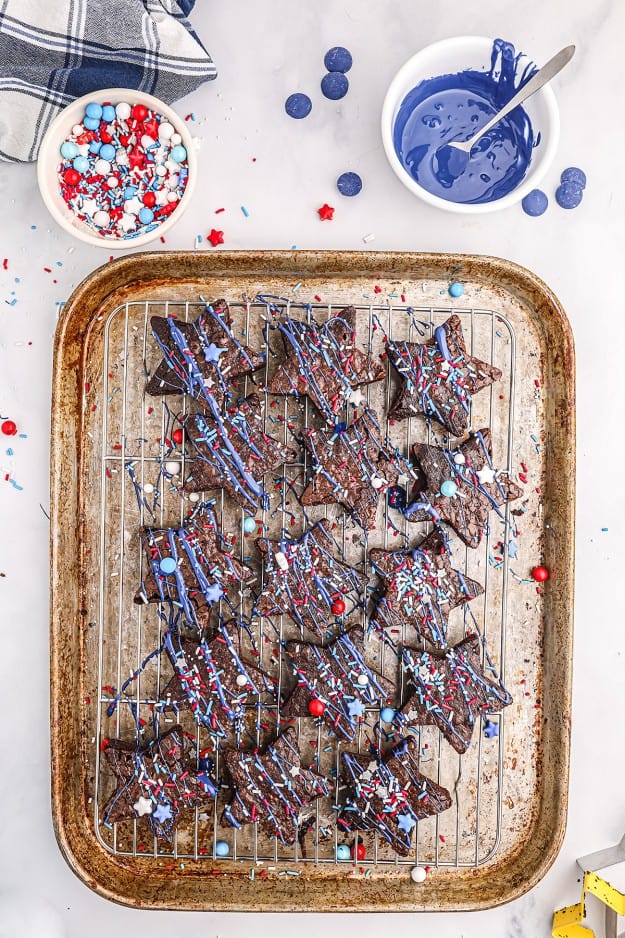 decorated brownies on cookie sheet.