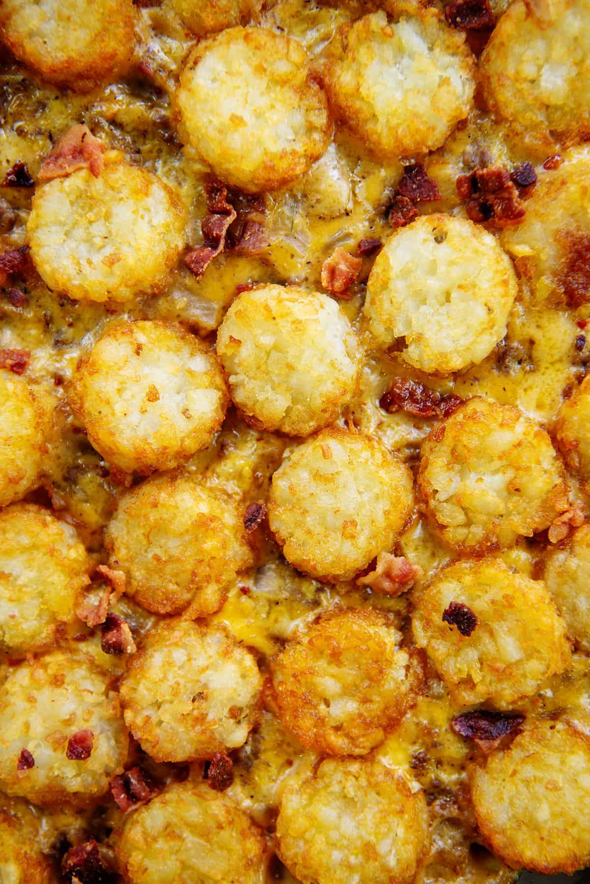 tots layered over cheesy beef.