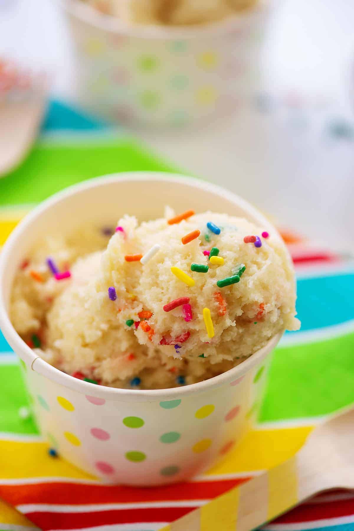 edible sugar cookie dough in small container.