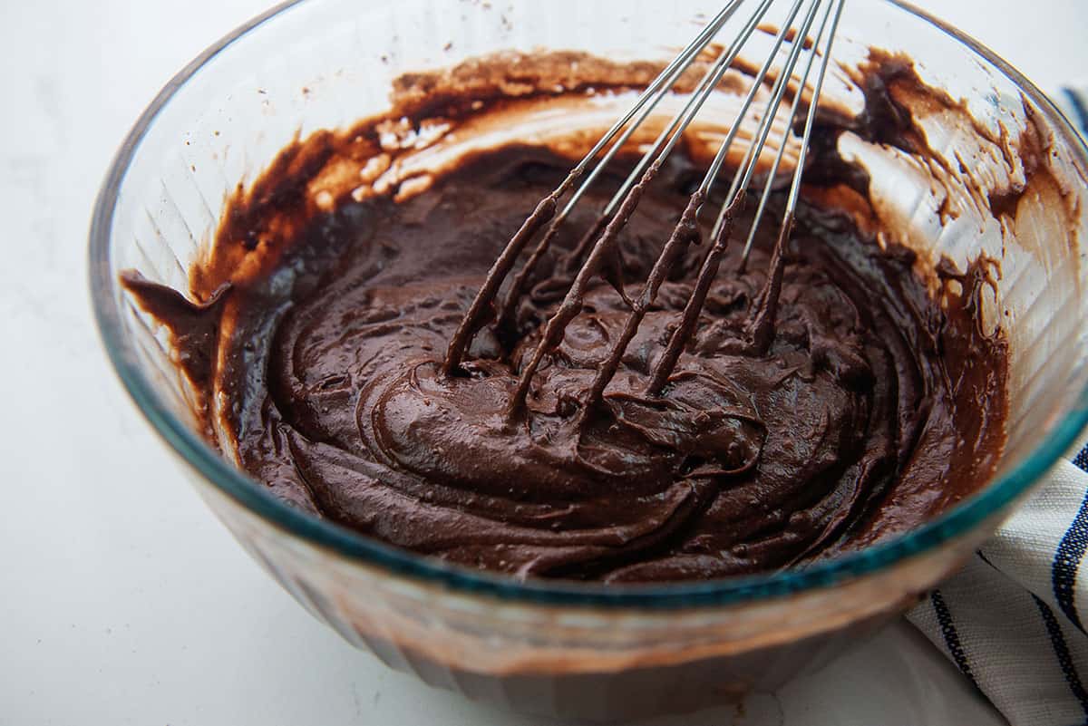 brownie batter in glass bowl.