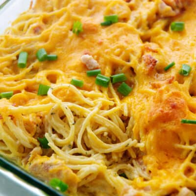 crack chicken spaghetti in glass baking dish.