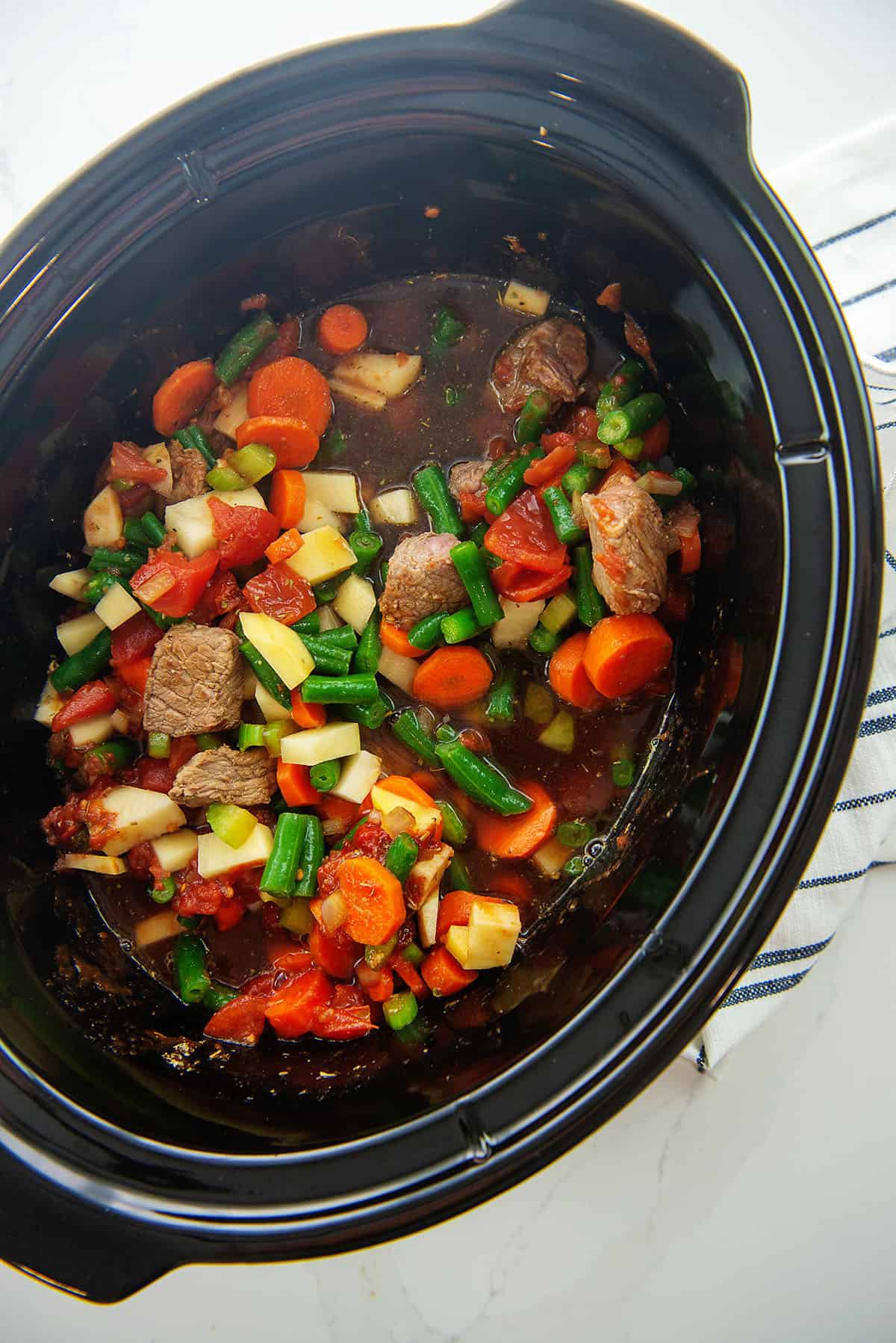 vegetable beef soup in slow cooker.
