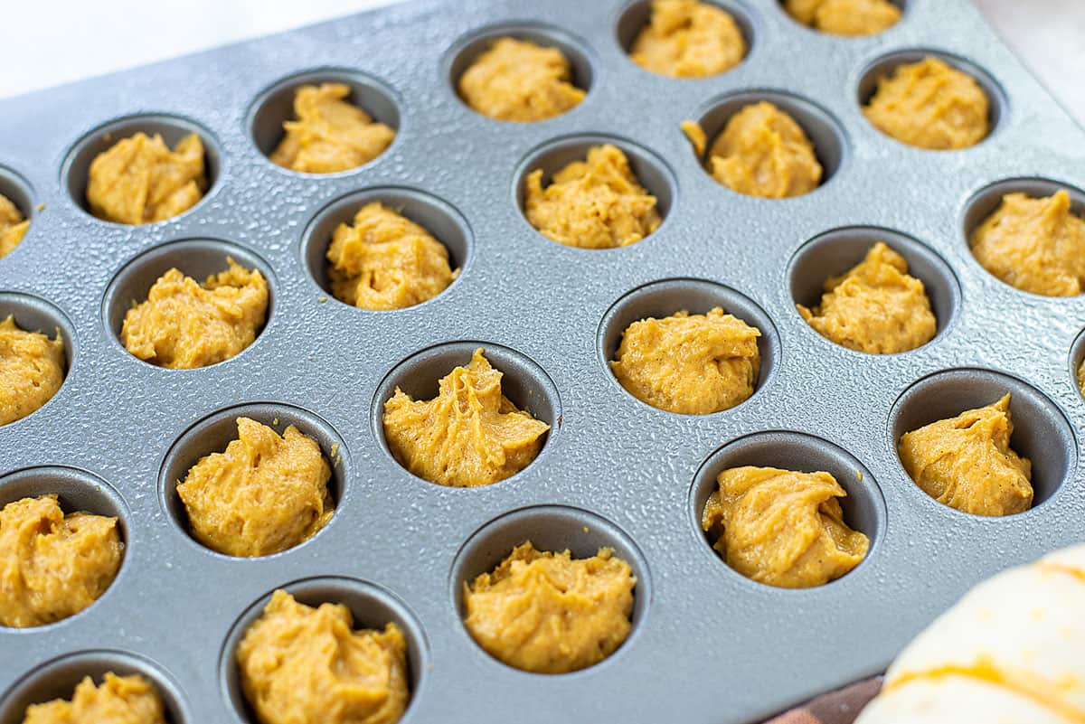 pumpkin muffins in mini muffin tin.