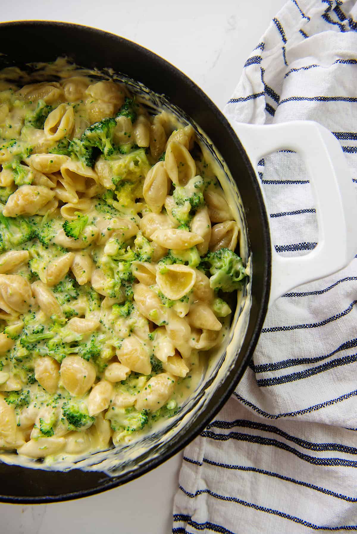 broccoli macaroni and cheese in sauce pan.