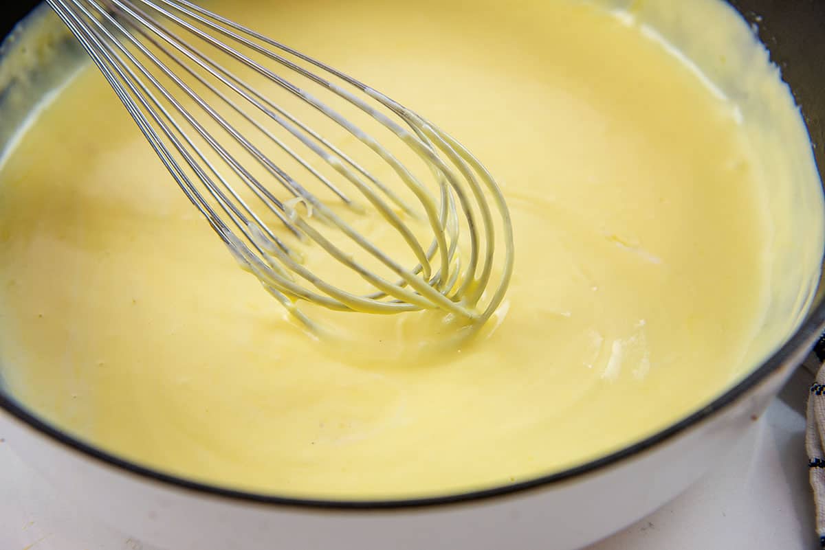 cheese sauce in white pan.