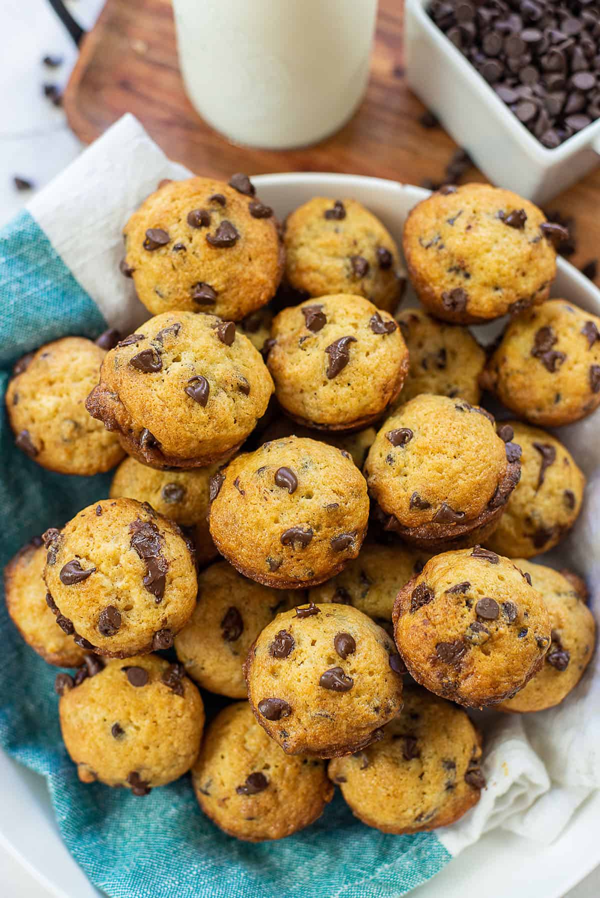 pile of mini chocolate chip muffins in bowl.