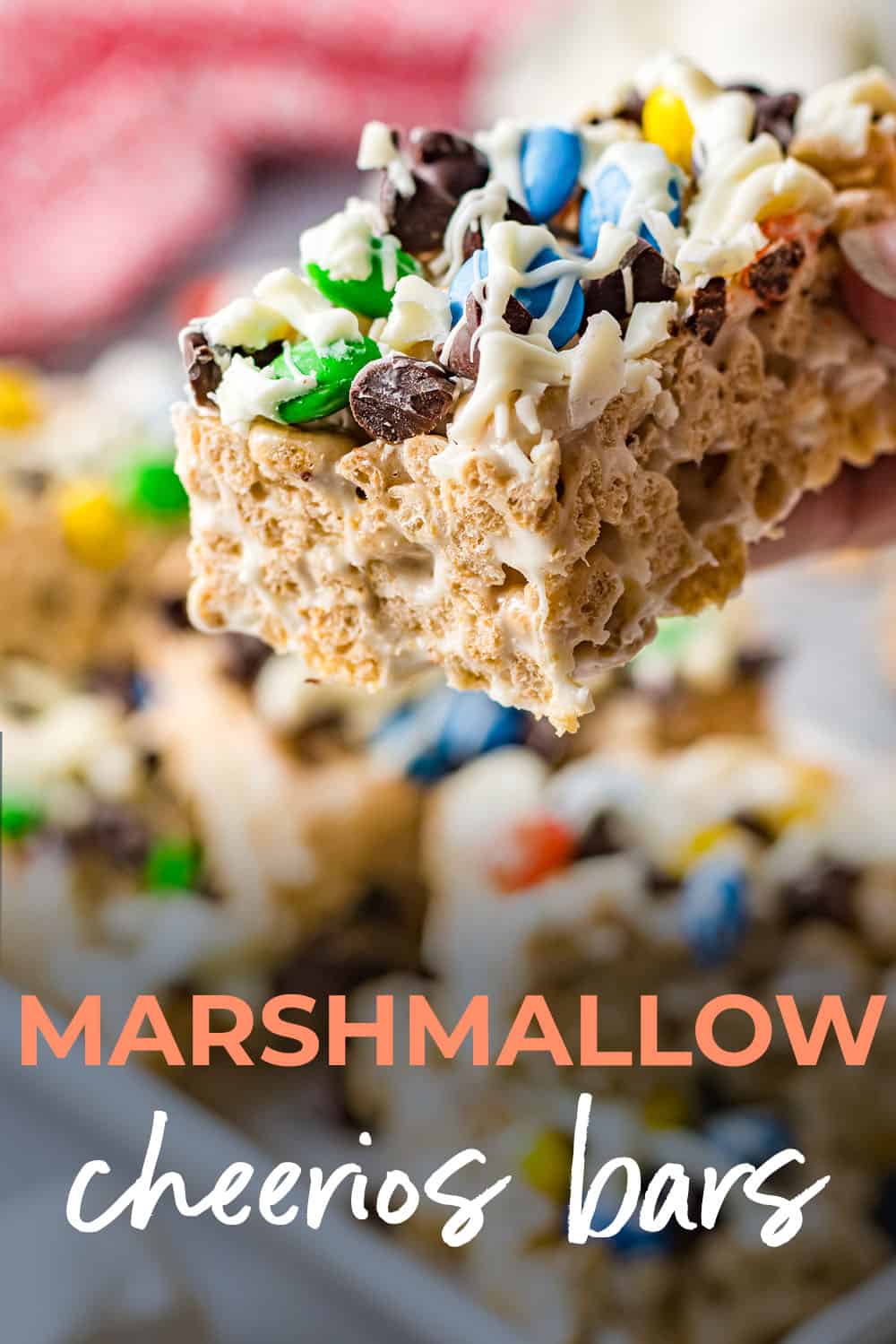 marshmallow cereal bars in hand.