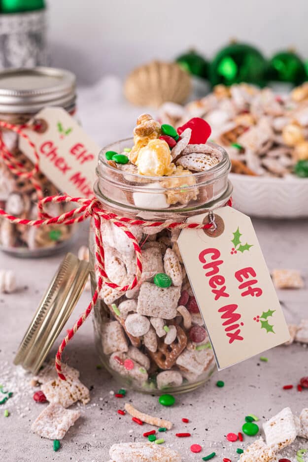 buddy the elf chex mix in glass jar.