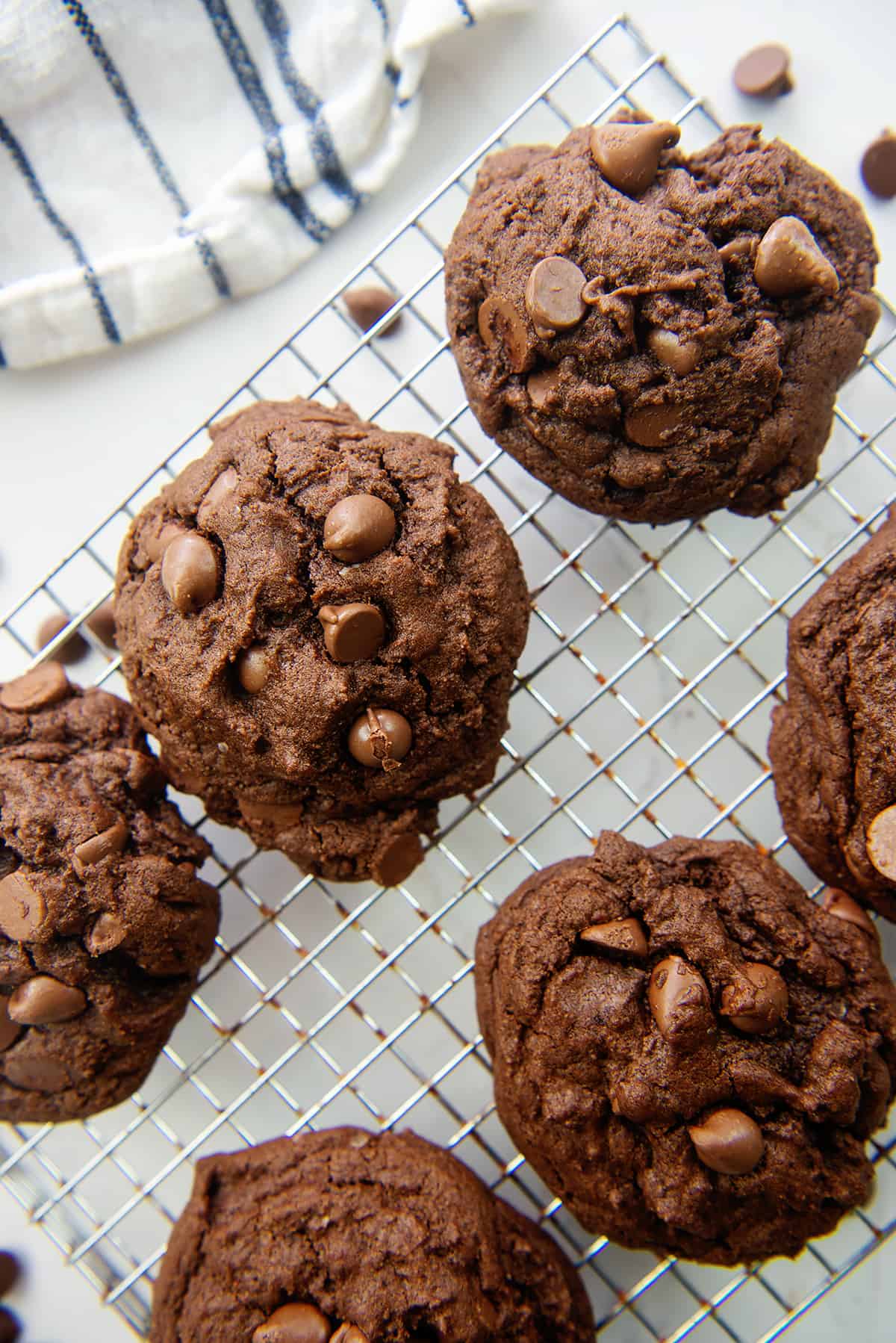 double chocolate chip cookies on cooling rack.