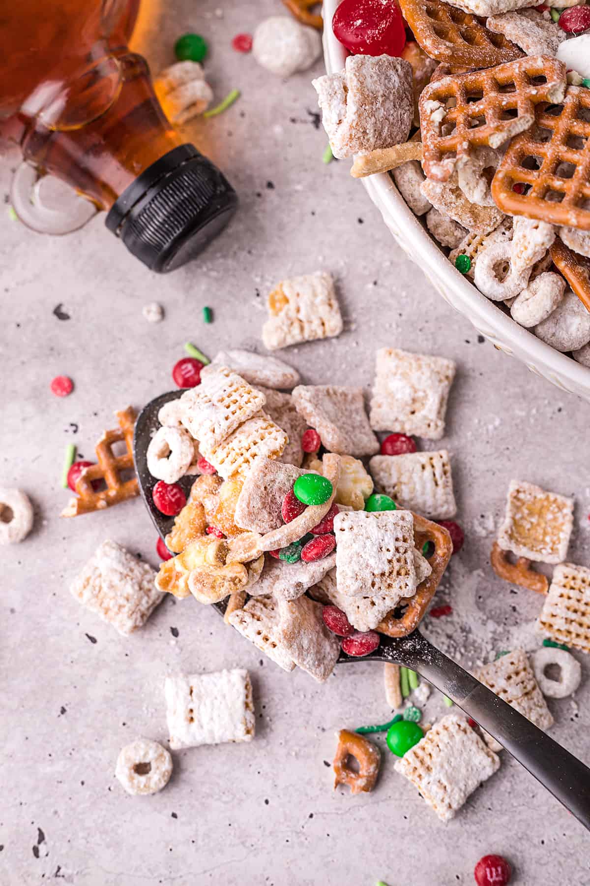 sweet Chex mix on a spoon.