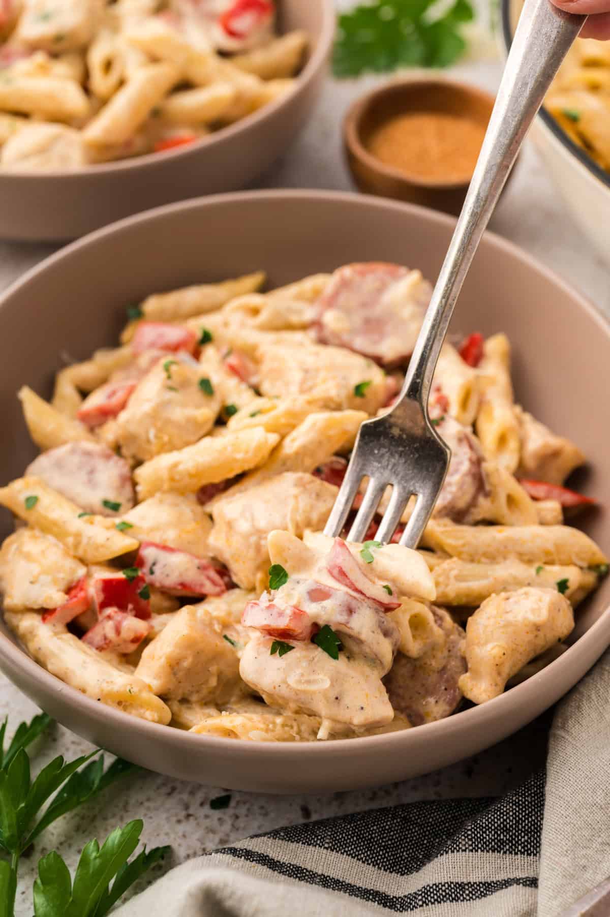 Forkful of cajun chicken sausage pasta.
