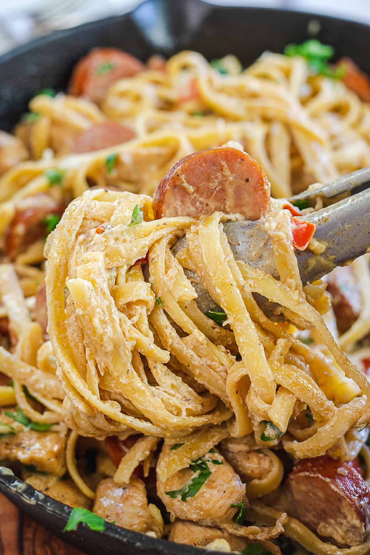 Cajun chicken pasta in skillet.