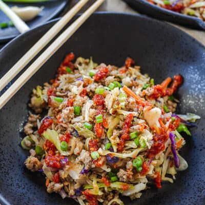 egg roll filling in a black bowl.