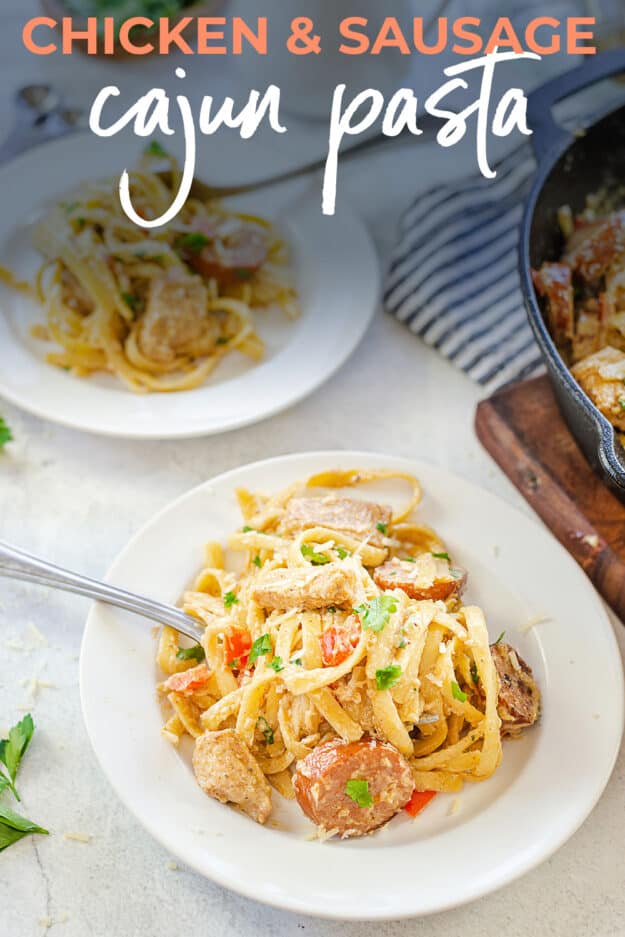 plateful of creamy Cajun pasta with text for Pinterest.