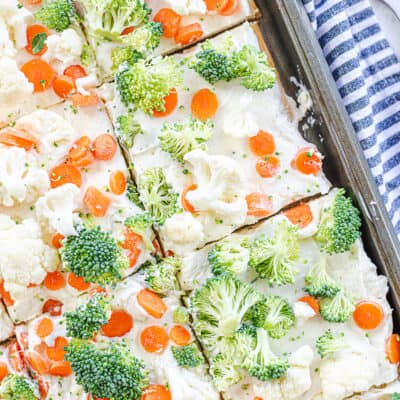 cold veggie pizza on sheet pan.