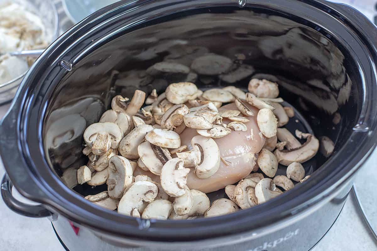 chicken and mushrooms in slow cooker.