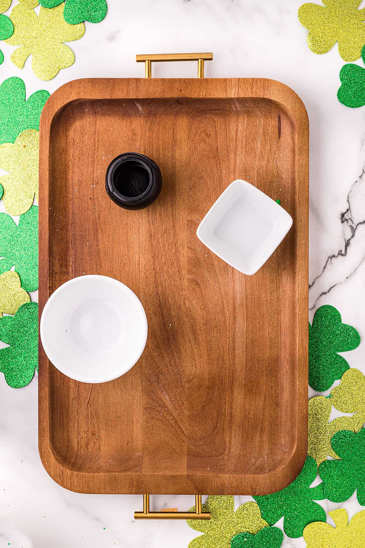 bowls on wooden tray.