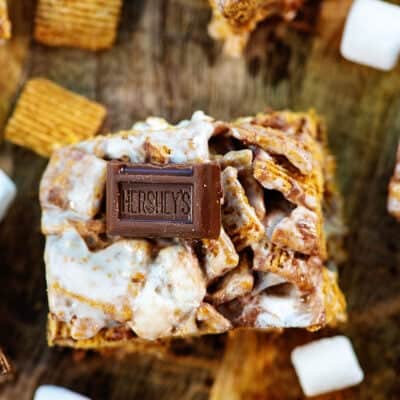 overhead view of s'mores bar on wooden board.