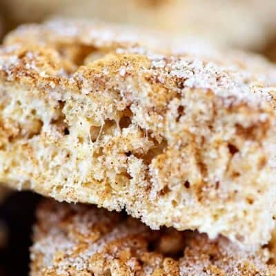 cereal treat stacked on cutting board.