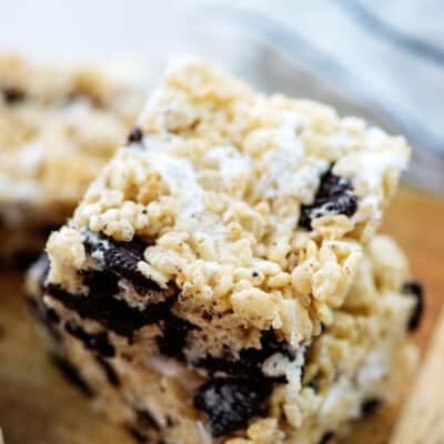 stack or Oreo rice crispy treats on wooden board