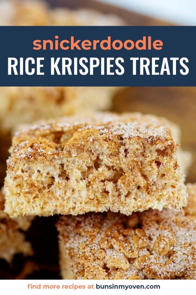 rice krispies treats stacked on wooden board.