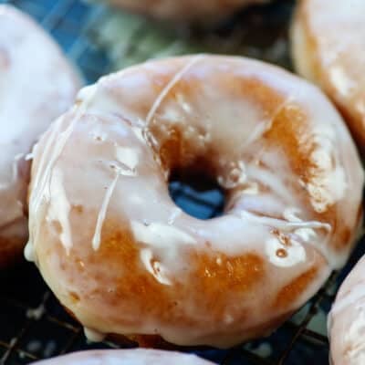 potato donuts piled on rack.