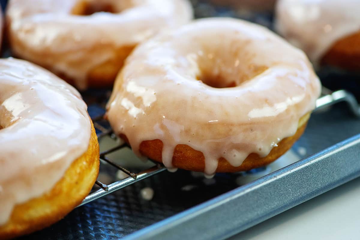 glazed donuts on wire rack.