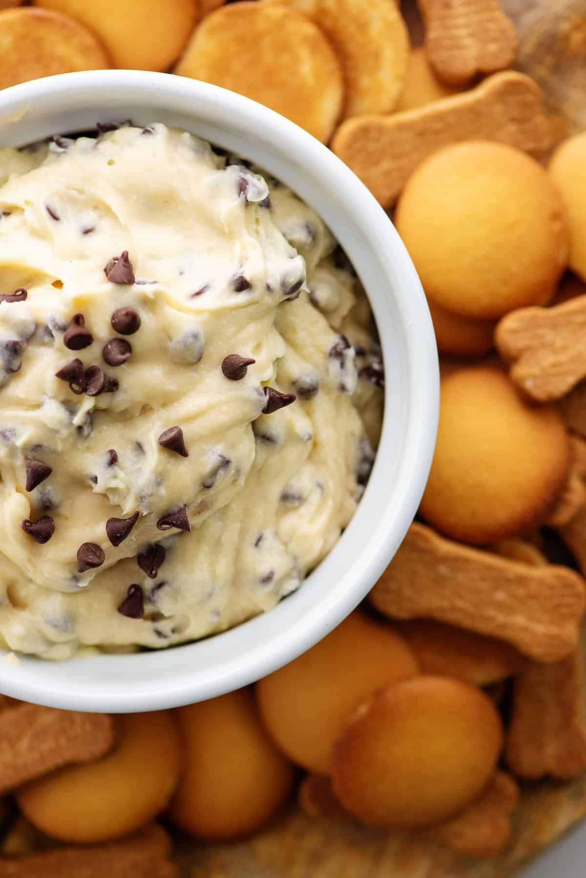 cookie dough dip recipe surrounded by crackers.