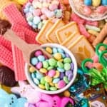 Easter candies piled on board.