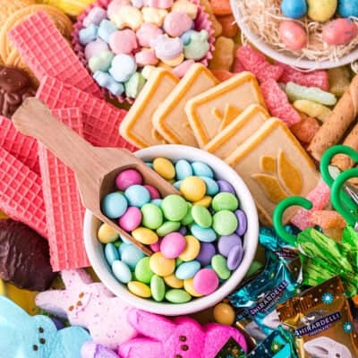 Easter candies piled on board.