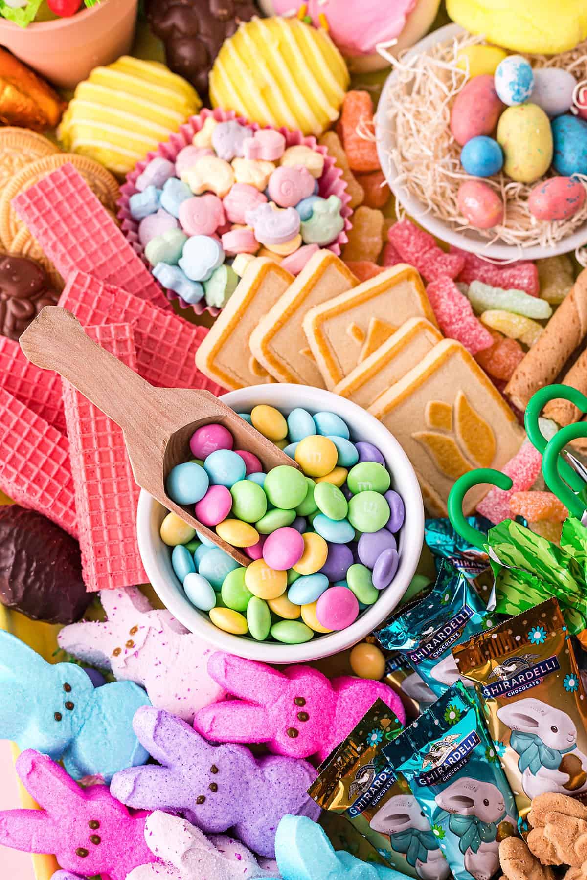 Easter candies piled on board.