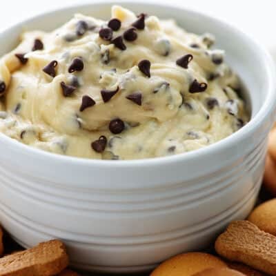 cookie dough dip in white bowl.