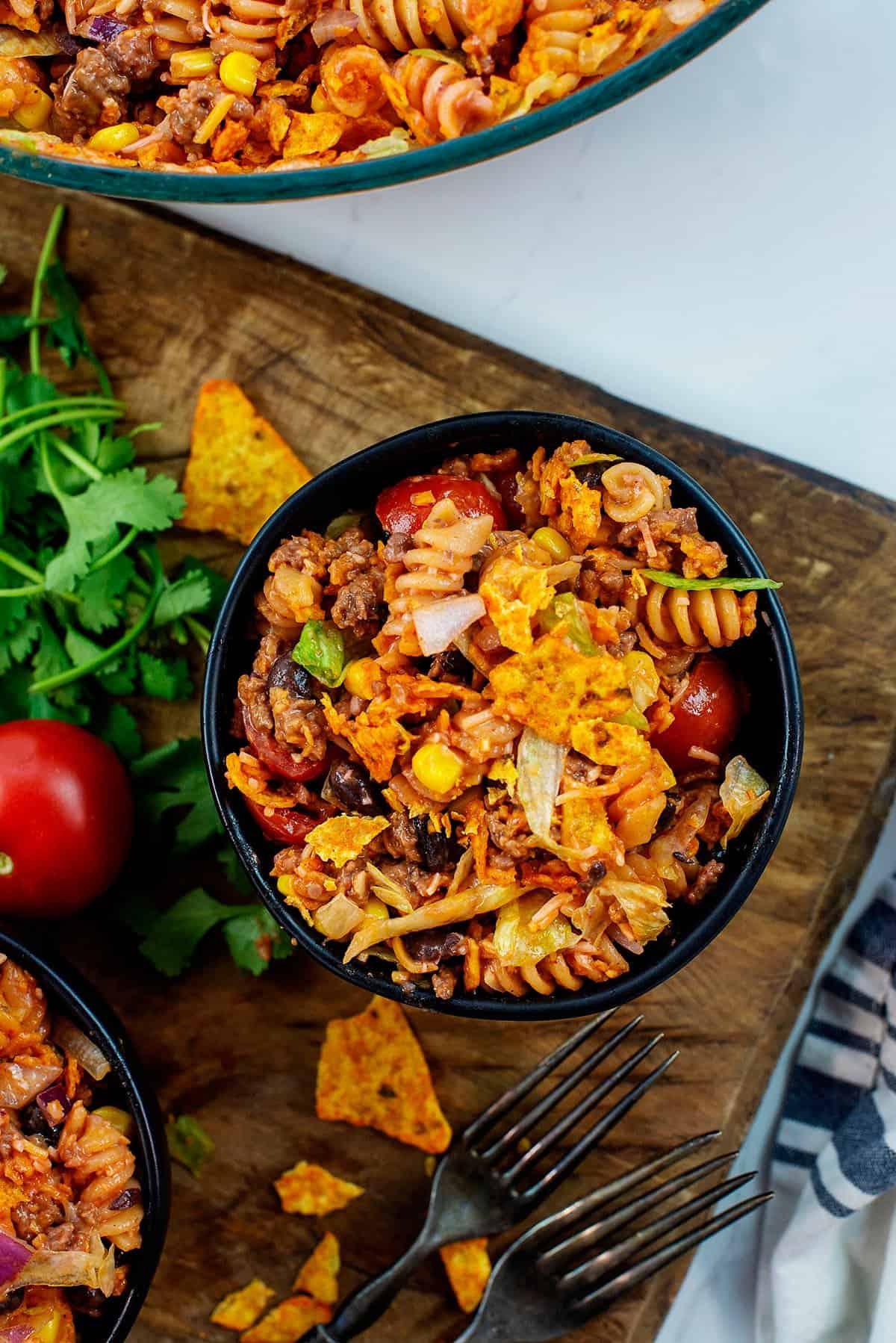 overhead view of pasta salad in blak bowl.