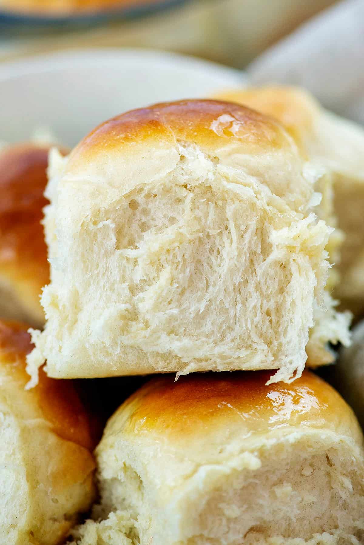 fluffy dinner roll in basket.