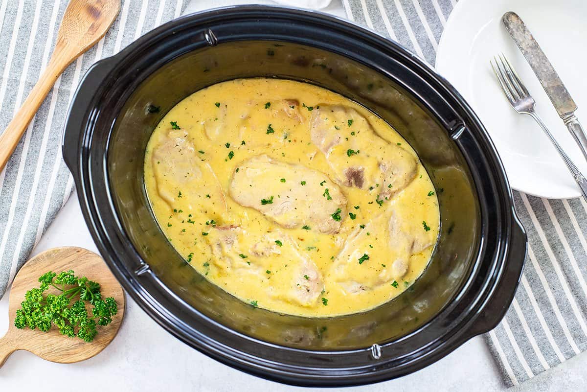 https://www.bunsinmyoven.com/wp-content/uploads/2022/04/pork-chops-in-crockpot.jpg