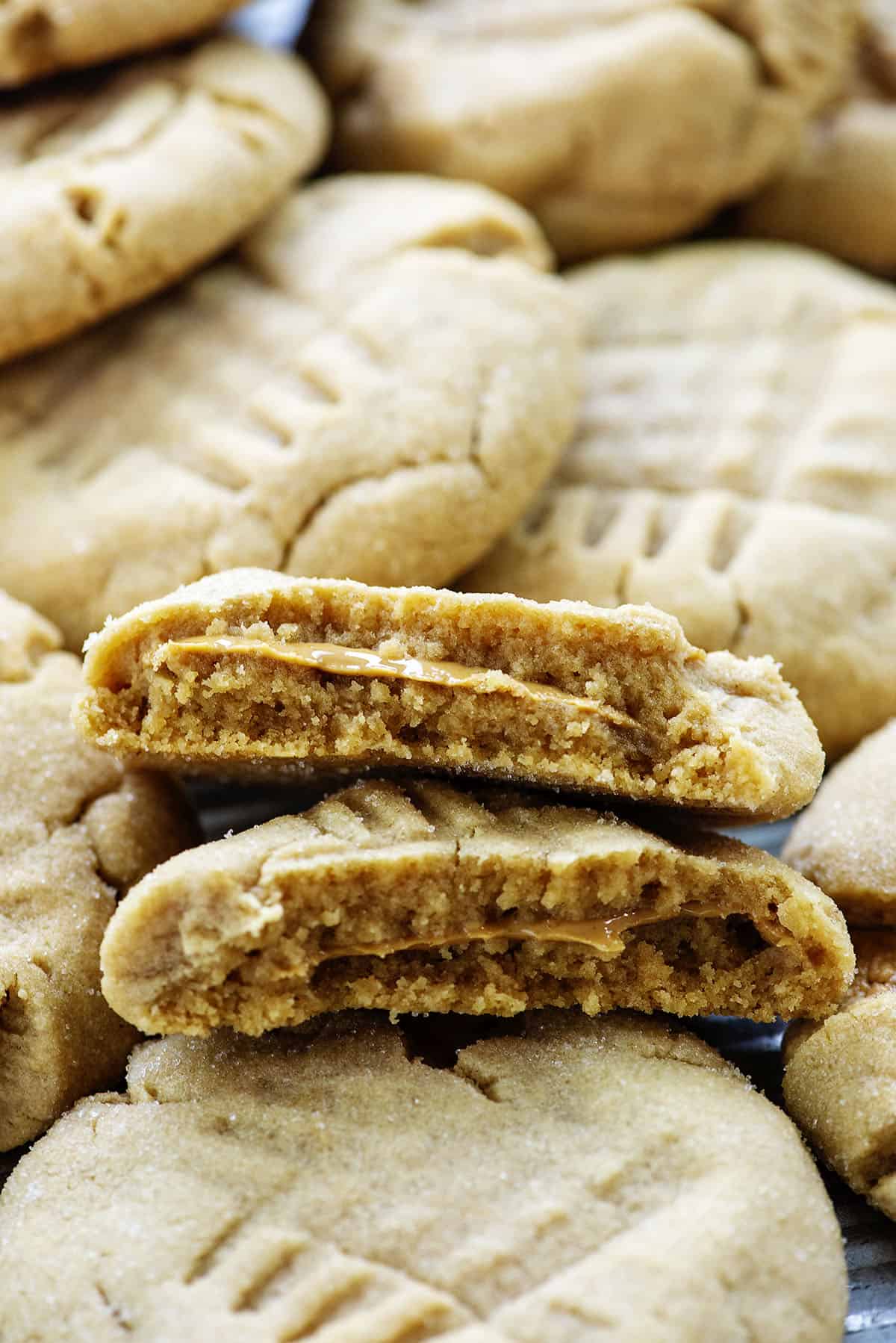 Peanut butter stuffed cookies piled together.