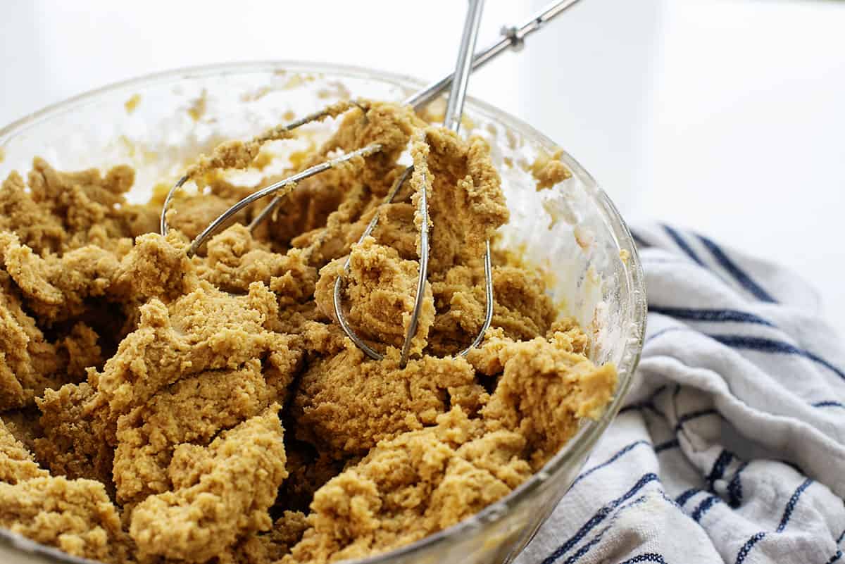 peanut butter cookie dough in glass bowl.