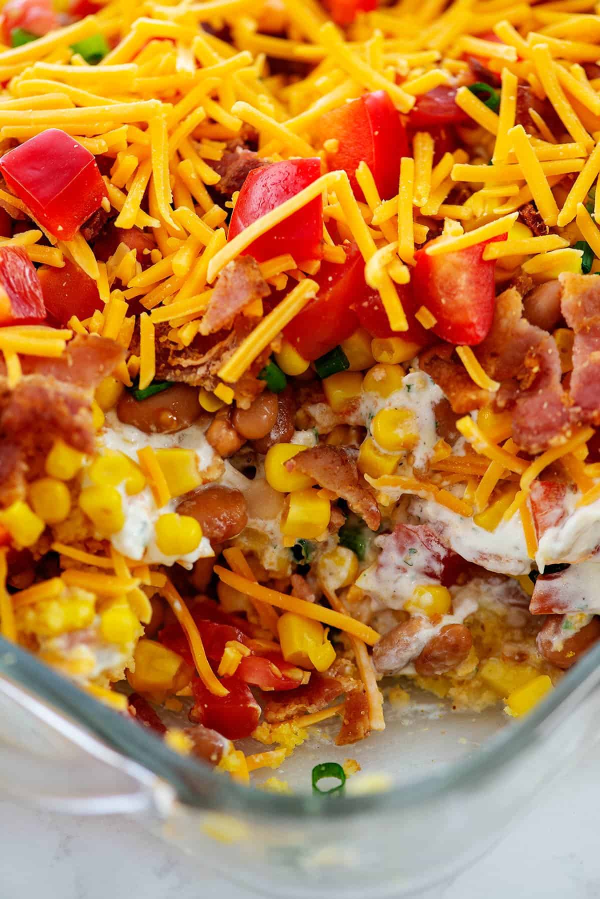 cornbread salad in glass baking dish.