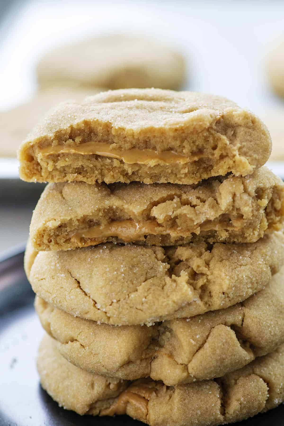 peanut butter stuffed peanut butter cookies in a stack.