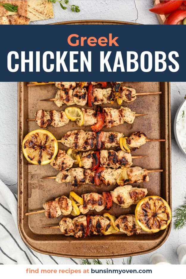 chicken kabobs on baking sheet.