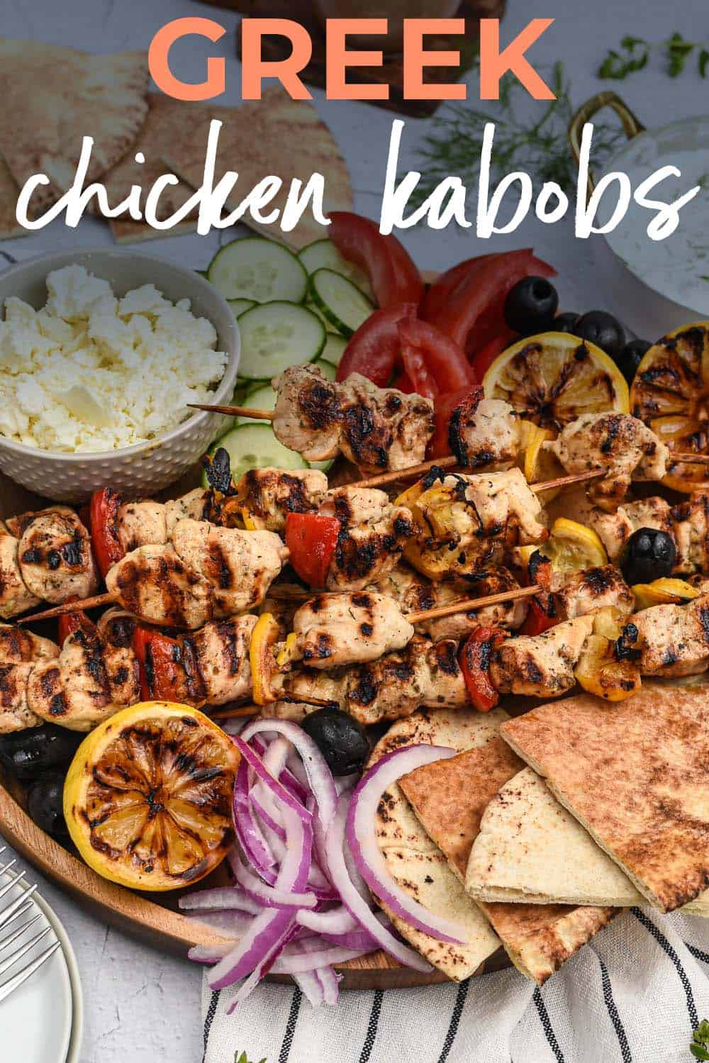 Greek chicken kabob platter with text for Pinterest.