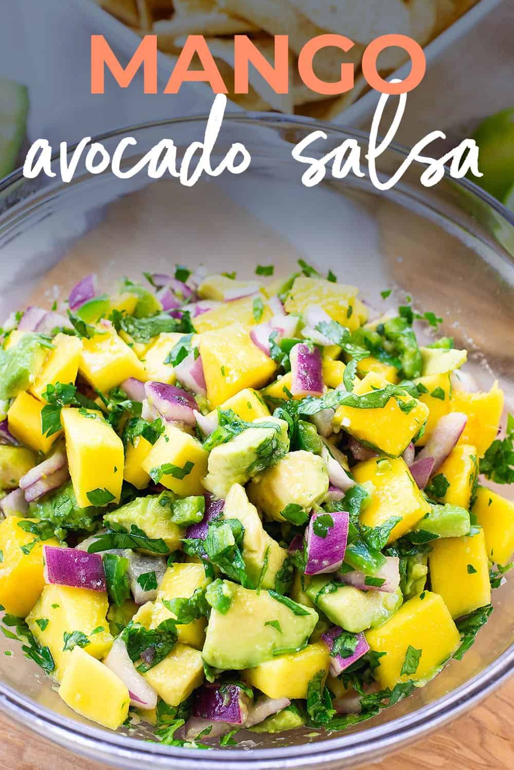 salsa with avocado and mango in glass bowl.