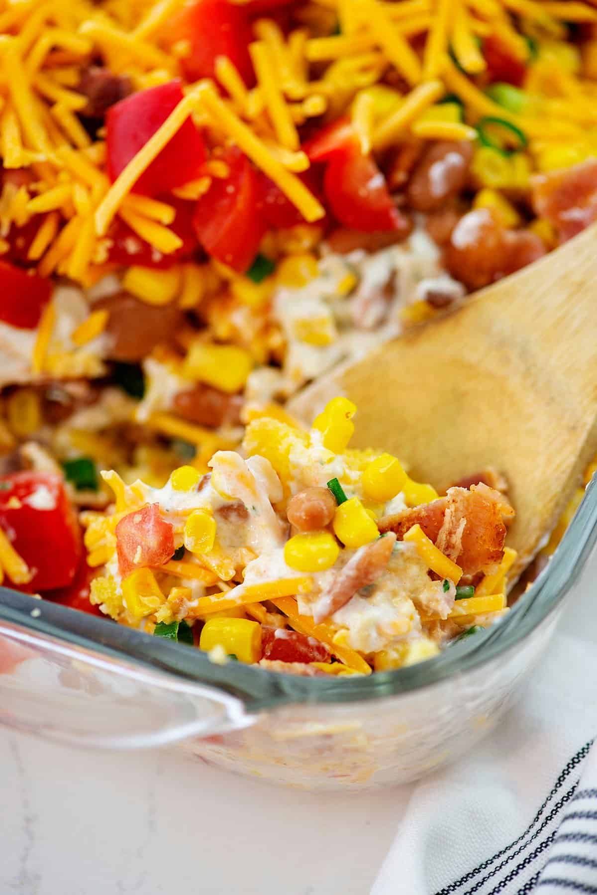 Southern cornbread salad on spoon.