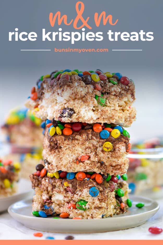 stack of rice krispies treats topped with m&m's.