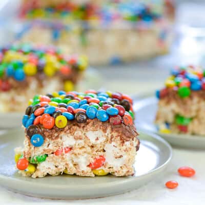 thick and chewy rice krispies treats topped with chocolate and m&m candies.