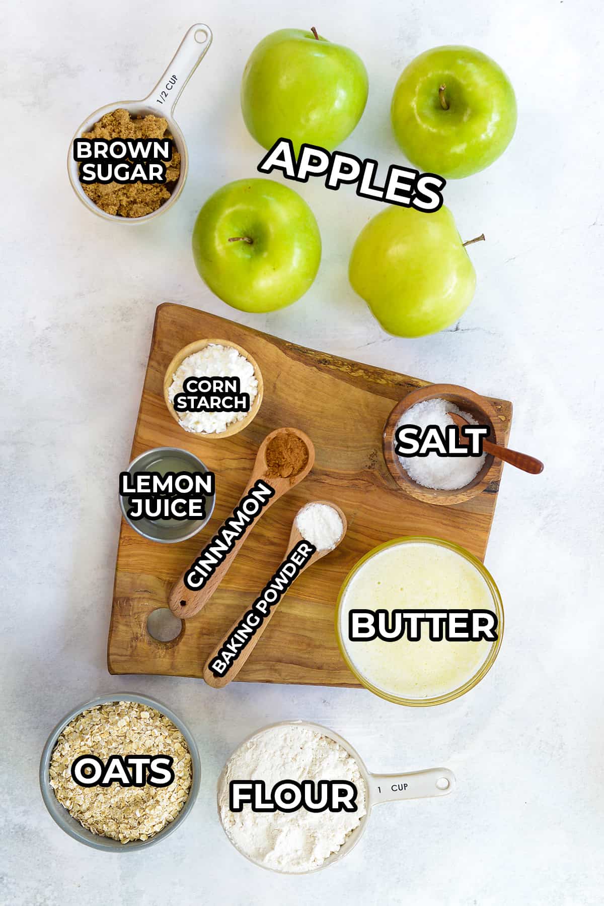 ingredients for apple crumble on counter top.